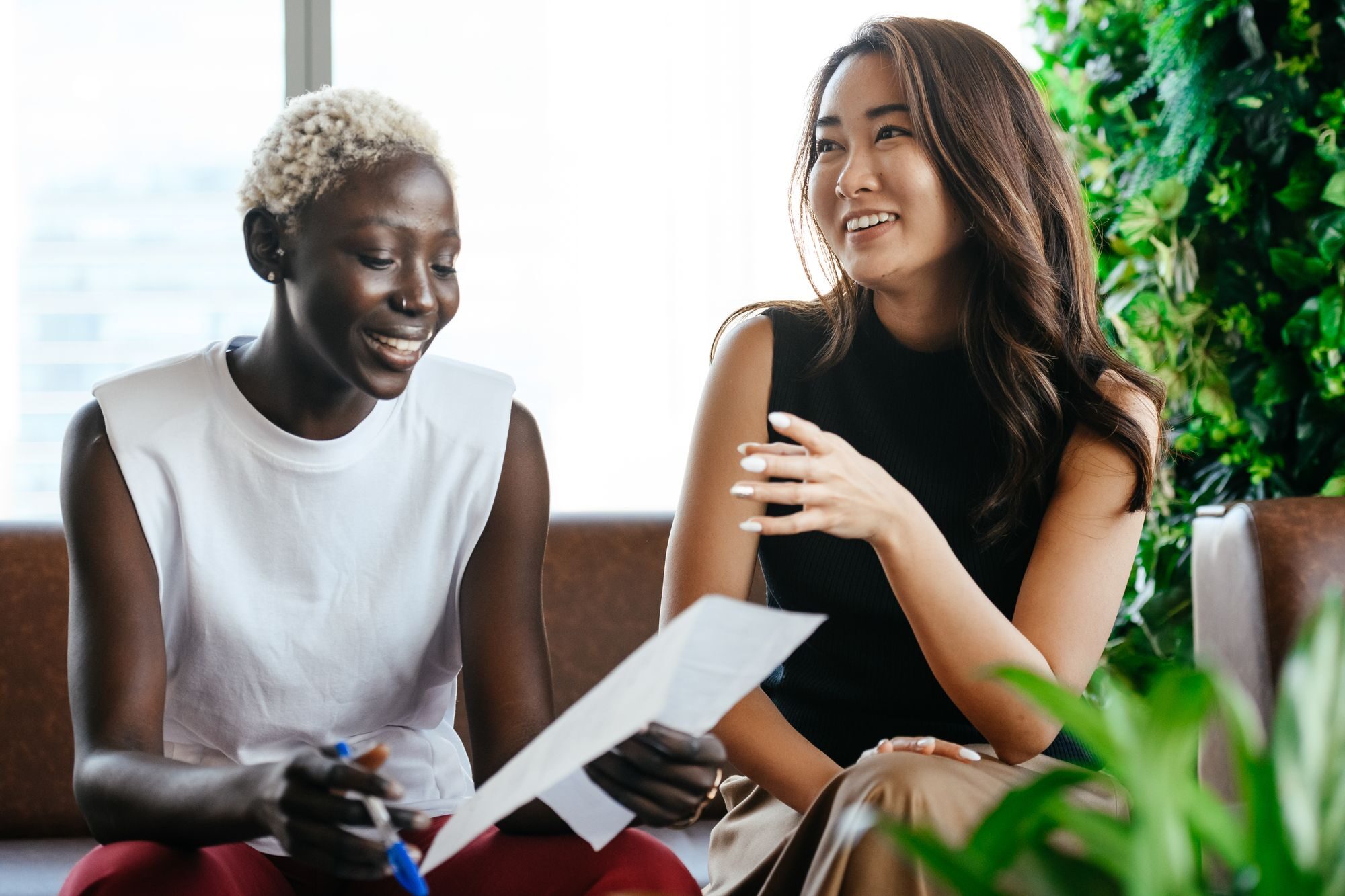 An advocate helping a resident review paperwork together