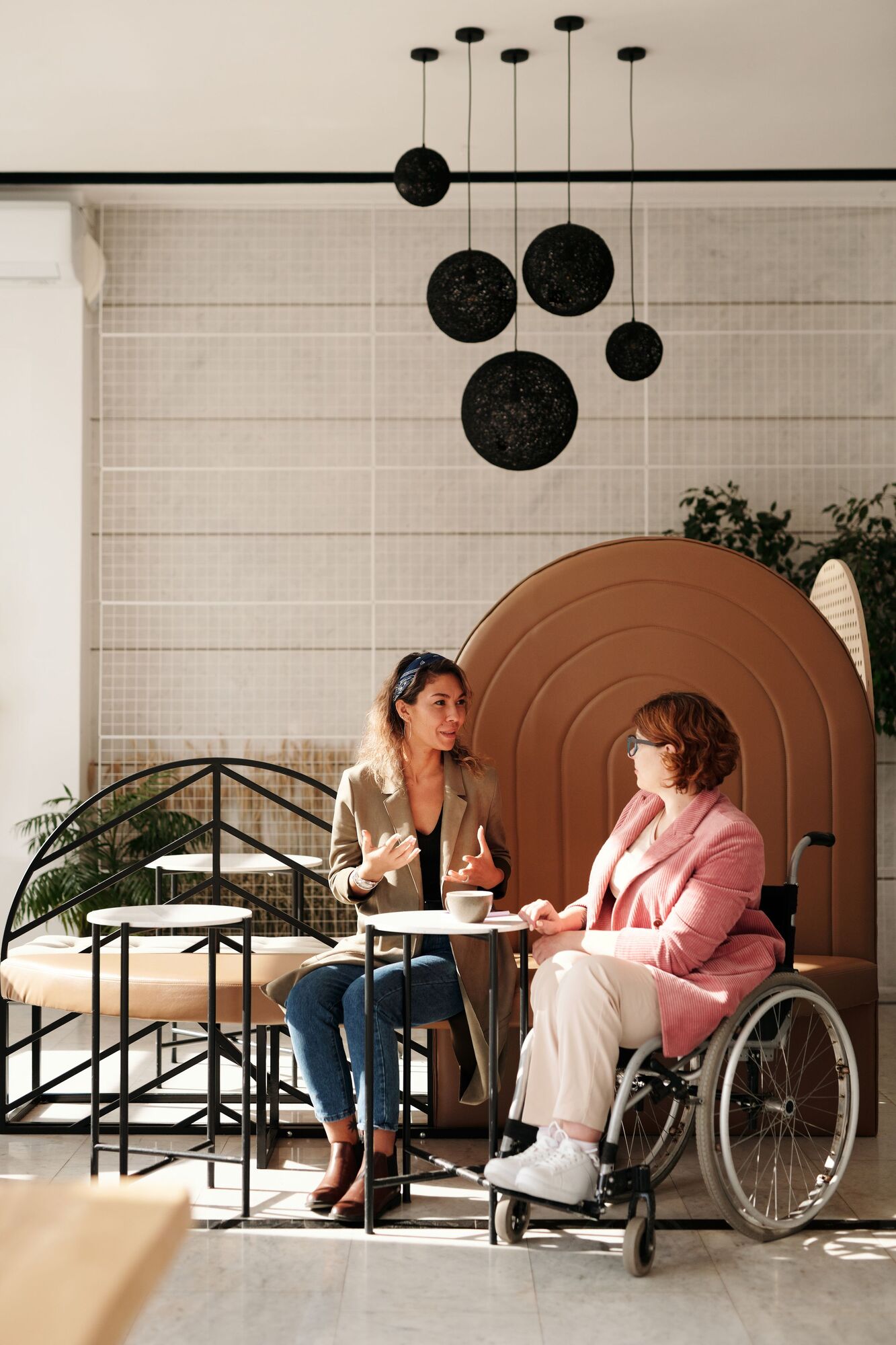 Two women in warm, supportive conversation