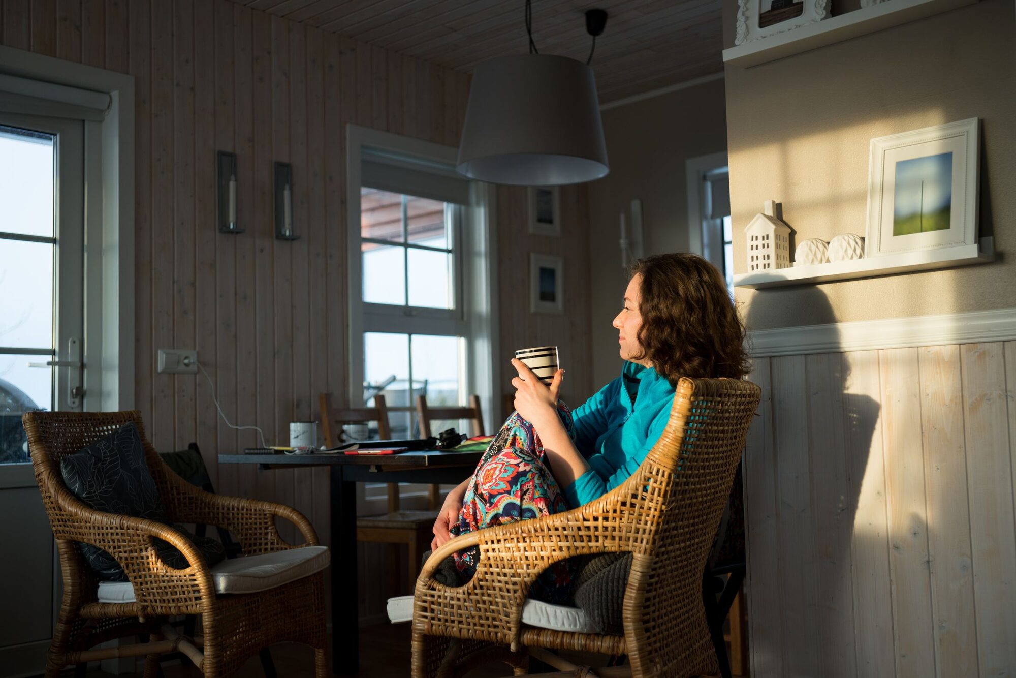 A woman veteran at home, calm and hopeful
